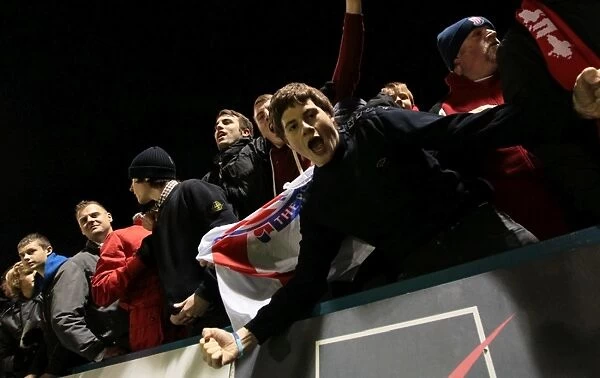 Stoke City Fans in Full Swing: A Passionate Atmosphere at Gillingham vs Stoke City (January 7, 2012)