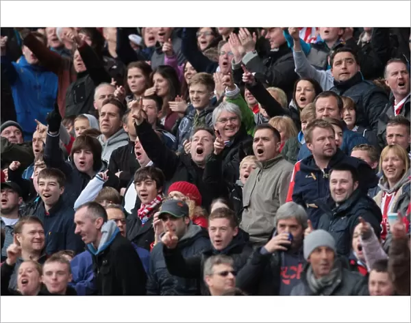 Stoke City vs Arsenal: Passionate Fans Clash at the Britannia Stadium, April 28, 2012