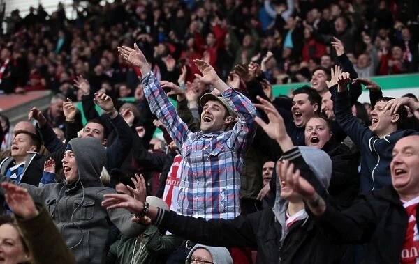 Passionate Clash: Stoke City vs Arsenal Fans at Britannia Stadium, April 28, 2012