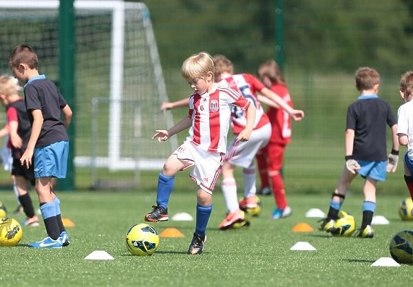 Stoke City FC: Nurturing Young Football Stars - Summer Program for Gifted Players (July 2013)