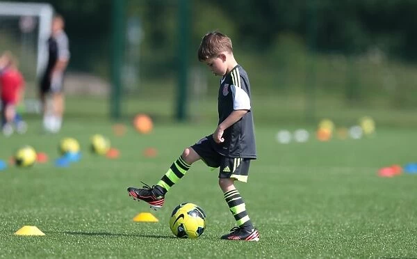 Stoke City FC: Summer Program 2013 - Nurturing Young Football Talents