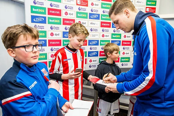 Stoke City FC vs Manchester City: A Football Rivalry in Images - Thrilling Moments: Stoke City Mascots and Exciting Action