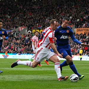 The Intense Battle: Stoke City vs Manchester United - April 14, 2013