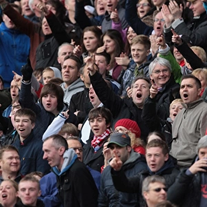 Stoke City vs Arsenal: Passionate Fans Clash at the Britannia Stadium, April 28, 2012