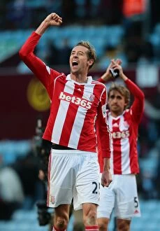 Images Dated 28th March 2014: Aston Villa vs Stoke City: Clash of the Midland Rivals - March 23, 2014