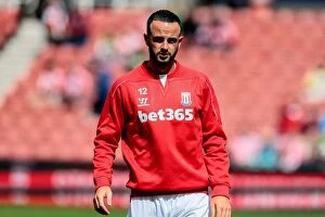 Marc Wilson Collection: Battle at the Bet365: Stoke City vs Aston Villa Clash (16th August 2014)