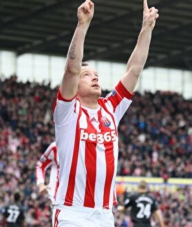 Images Dated 27th April 2013: Battle at the Bet365: Stoke City vs Norwich City - April 27, 2013