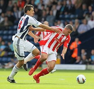 Images Dated 28th August 2011: Battle at The Hawthorns: West Bromwich Albion vs Stoke City (August 28, 2023)