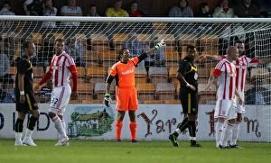 Images Dated 6th August 2012: Battle at Plainmoor: Stoke City's August Clash with Torquay United (2012)