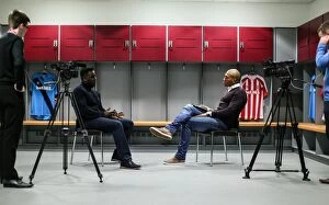 Images Dated 17th November 2014: Chris Iwelumo interviews ex Stoke City star Ade Akinbiyi for Stoke City TV