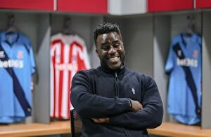 14-15 Burnley Programme Collection: Chris Iwelumo interviews ex Stoke City star Ade Akinbiyi for Stoke City TV