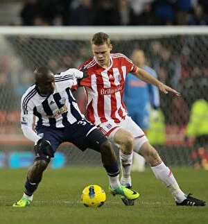 Images Dated 21st January 2012: Clash at the Bet365 Stadium: Stoke City vs. West Bromwich Albion (January 21, 2012)