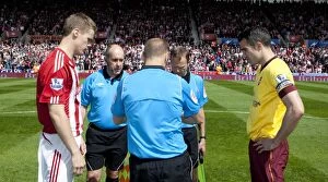Images Dated 8th May 2011: Clash at the Bet365 Stadium: Stoke City vs Arsenal - May 8, 2011