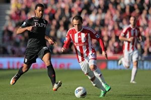 Images Dated 15th October 2011: Clash at the Bet365 Stadium: Stoke City vs Fulham - October 15, 2011