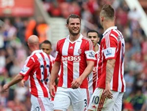 Images Dated 13th May 2014: Clash at the Bet365 Stadium: Stoke City vs Fulham - May 3, 2014