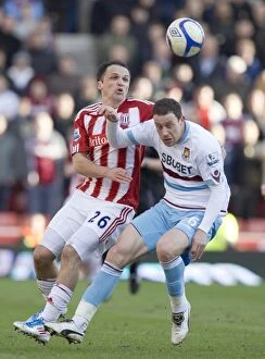 Images Dated 13th March 2011: Clash at the Bet365 Stadium: Stoke City vs West Ham United - March 13, 2011