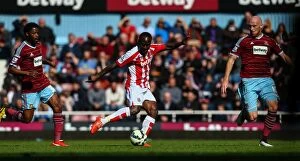 Images Dated 20th April 2015: Clash at the Boleyn Ground: West Ham vs Stoke City - April 11, 2015
