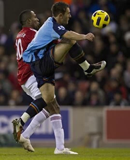 Images Dated 11th December 2010: Clash at the Britannia: Stoke City vs Blackpool - December 11, 2010