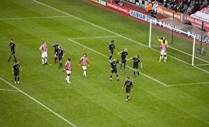 Images Dated 16th January 2010: Clash at the Britannia: Stoke City vs Liverpool (January 16, 2010)