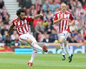 Images Dated 8th May 2011: Clash at the Brittania: Stoke City vs Arsenal - May 8, 2011
