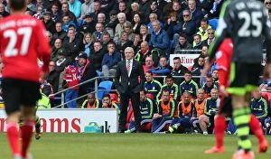 Images Dated 22nd April 2014: Clash at Cardiff: Stoke City vs Cardiff City - April 19, 2014