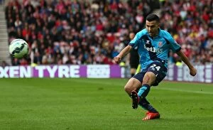 Oussama Assaidi Collection: Clash of the Championship Contenders: Sunderland vs Stoke City (October 4, 2014)