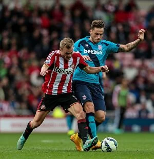Images Dated 8th October 2014: Clash of the Championship Contenders: Sunderland vs Stoke City (October 4, 2014)