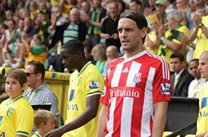 Images Dated 21st August 2011: Clash of the Championship Titans: Norwich City vs Stoke City (August 21, 2011)