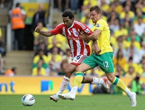 Images Dated 21st August 2011: Clash of the Championship Titans: Norwich City vs Stoke City (2011)