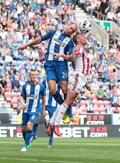 Wigan Athletic v Stoke City Collection: Clash at DW Stadium: Stoke City vs Wigan Athletic - September 1, 2012