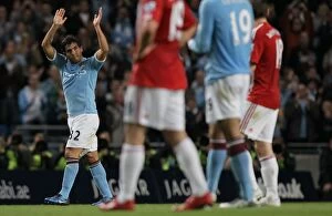 Images Dated 17th May 2011: Clash at the Etihad: Manchester City vs Stoke City - May 17, 2011