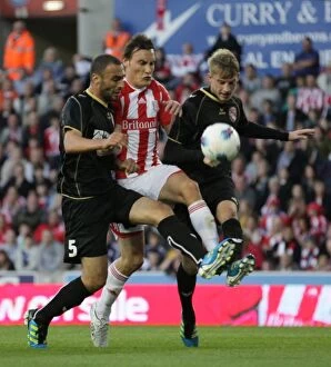 Images Dated 25th August 2011: Clash of the Europa League Titans: Stoke City vs FC Thun (25.8.2011)