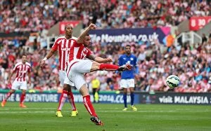 Stoke City v Leicester City Collection: Clash of the Midland Giants: Stoke City vs Leicester City (September 13, 2014)