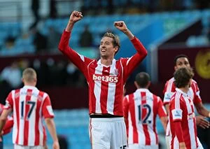 Images Dated 28th March 2014: Clash of the Midland Rivals: Aston Villa vs Stoke City - March 23, 2014