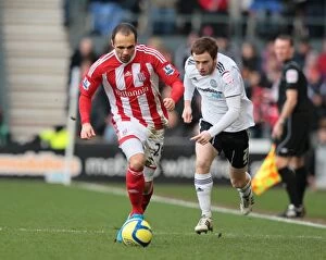 Images Dated 28th January 2012: Clash of the Midland Rivals: Derby County vs Stoke City - January 28, 2012