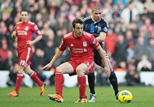 Images Dated 14th January 2012: Clash of the Titans: Liverpool vs Stoke City (January 14, 2012)