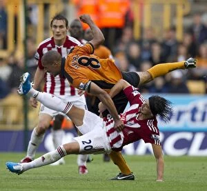 Images Dated 14th August 2010: Clash of the Titans: Wolverhampton Wanderers vs Stoke City (August 14, 2010)
