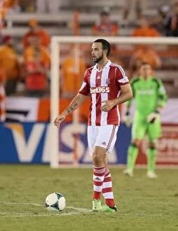 Images Dated 13th August 2013: Houston Dynamo vs. Stoke City: Clash of Soccer Titans