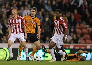 Images Dated 26th April 2011: The Intense Rivalry: Stoke City vs. Wolverhampton Wanderers - A Passionate Battle (April 2011)