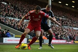Images Dated 14th January 2012: Liverpool vs. Stoke City: Clash at Anfield (14.01.2012)