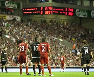 Images Dated 19th August 2009: Liverpool vs Stoke City: Clash at Anfield - August 19, 2009