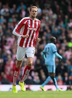 Manchester City v Stoke City Collection: Manchester City vs Stoke City: Clash at The Etihad - August 30, 2014