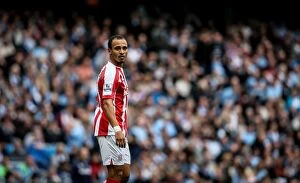 Peter Odemwingie Collection: Manchester City vs Stoke City: Clash at the Etihad - August 30, 2014