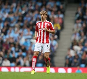 Marc Muniesa Collection: Manchester City vs Stoke City: Clash at the Etihad (August 30, 2014)