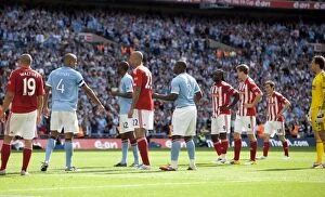 Images Dated 14th May 2011: Manchester City vs Stoke City: Clash at the Etihad (May 14, 2011)