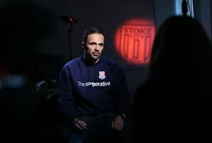 13-14 Aston Villa Programme Collection: Matthew Etherington helps out Cooperative and Stoke City Community team