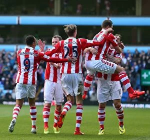 Images Dated 28th March 2014: Midland Rivalry: Aston Villa vs. Stoke City - March 23, 2014