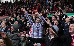 Images Dated 28th April 2012: Passionate Clash: Stoke City vs Arsenal Fans at Britannia Stadium, April 28, 2012