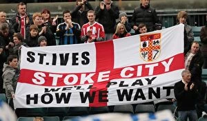 Images Dated 7th January 2012: Passionate Fans of Stoke City in Action at Gillingham Match on January 7, 2012