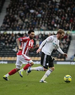Images Dated 28th January 2012: Pride Park Clash: Derby County vs Stoke City - January 28, 2012